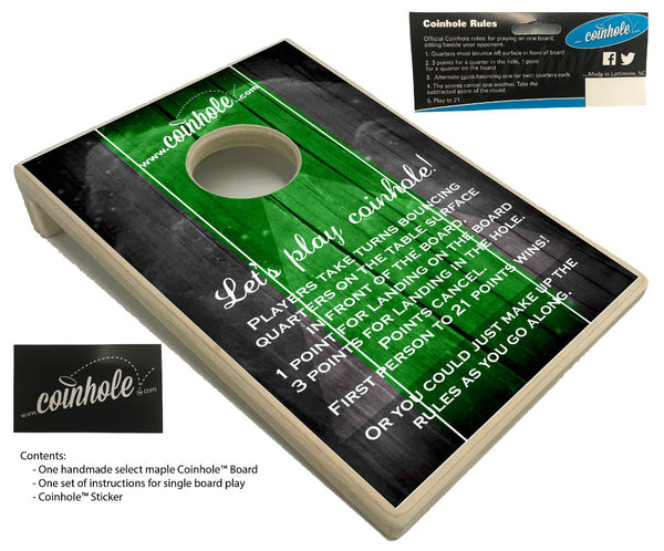 green and black official coinhole board